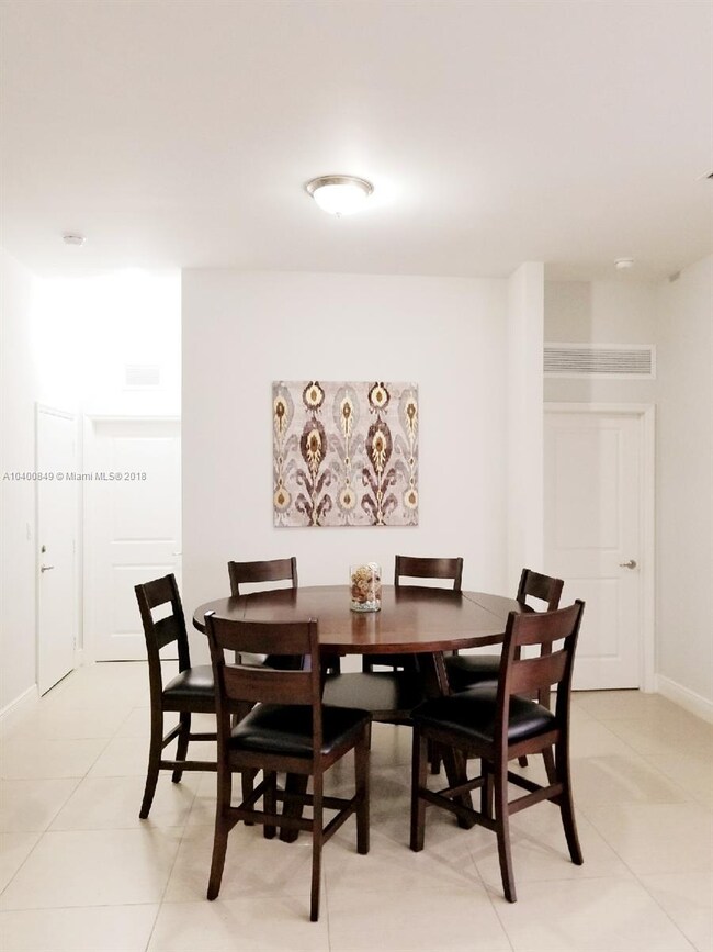 Dining Room area adjacent to the open kitchen.