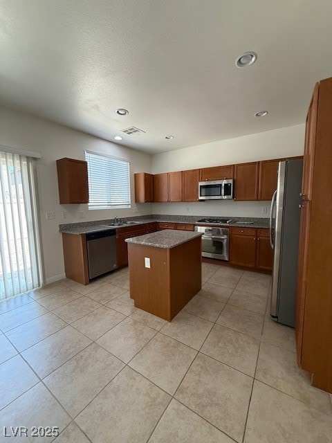 Kitchen featuring dishwasher, fridge, range, a kit