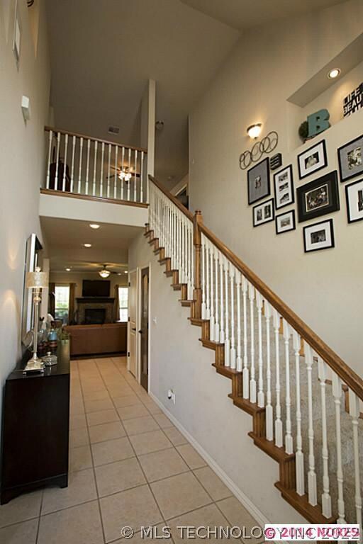 Staircase to second story with Art Coves