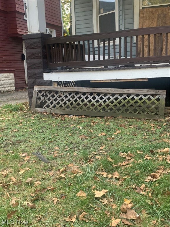 View of exterior entry with a porch