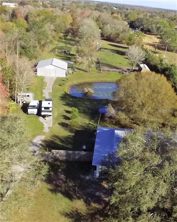 Side of the home and farm view
