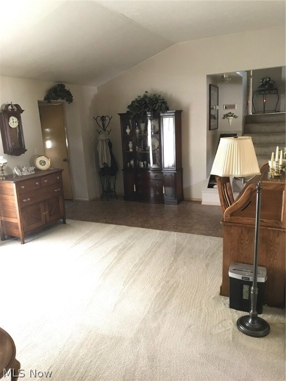 OFF WHITE CARPETING IN THE LIVING & DINING ROOMS