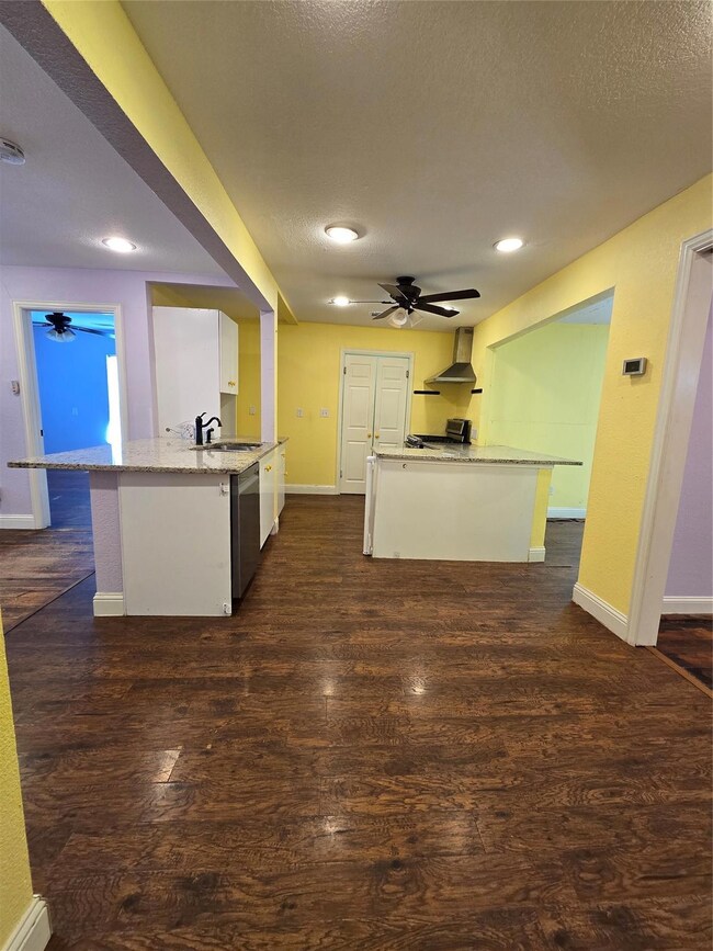 Kitchen featuring dark hardwood / wood-style floor