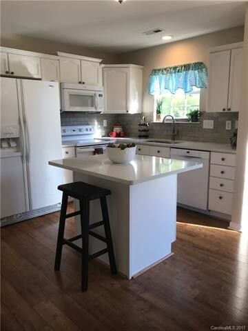 New quartz counter tops and tile backsplash.