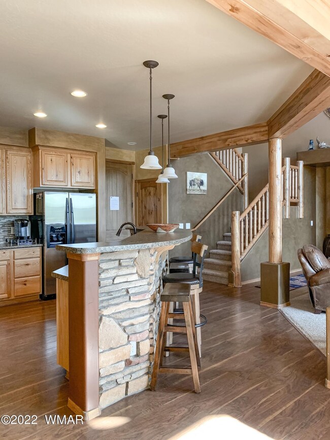 fairway views iP kitchen island to stair