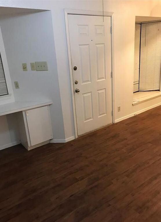 Doorway with built in study area, dark wood finis