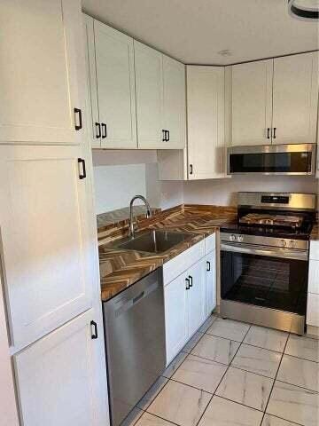 3566 N University Dr unit F5, Coral Springs, FL 33065 - photo 2