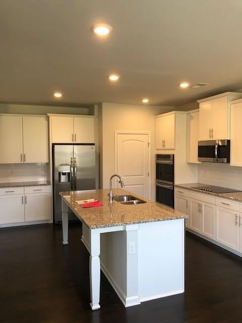 Gourmet kitchen with double ovens Actual home