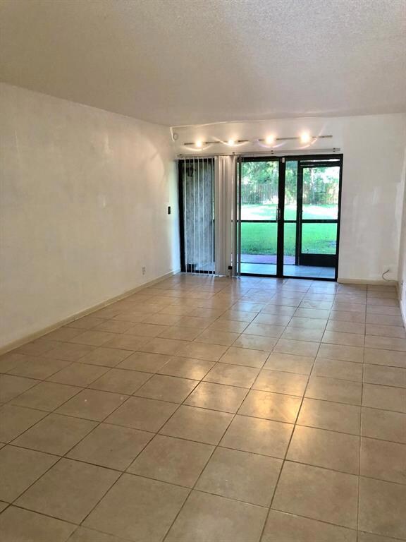 5975 Forest Hill Blvd unit 103, West Palm Beach, FL 33415 - photo 2