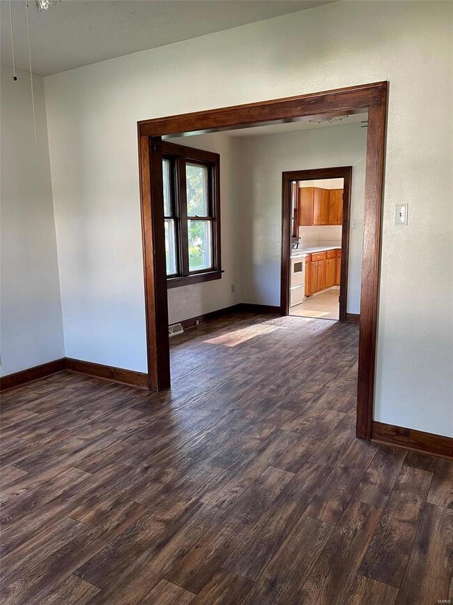 Living room transitions to dining room