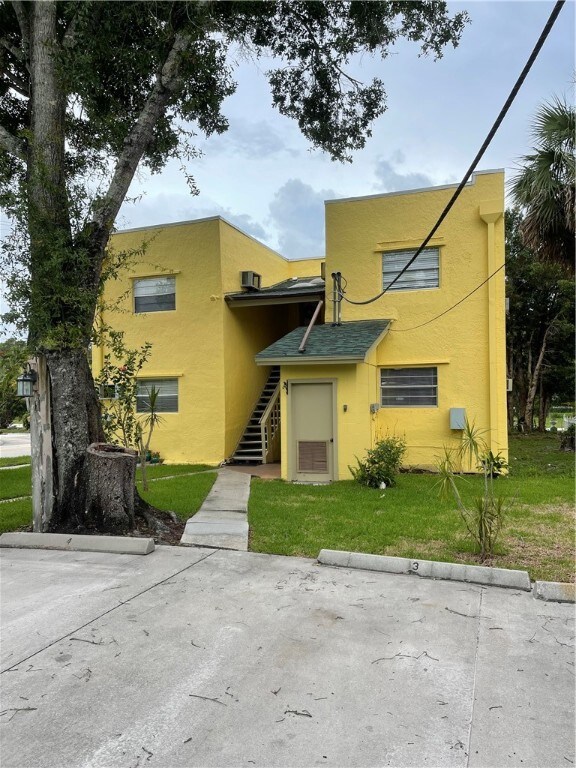 Rear parking assigned one space per apartment