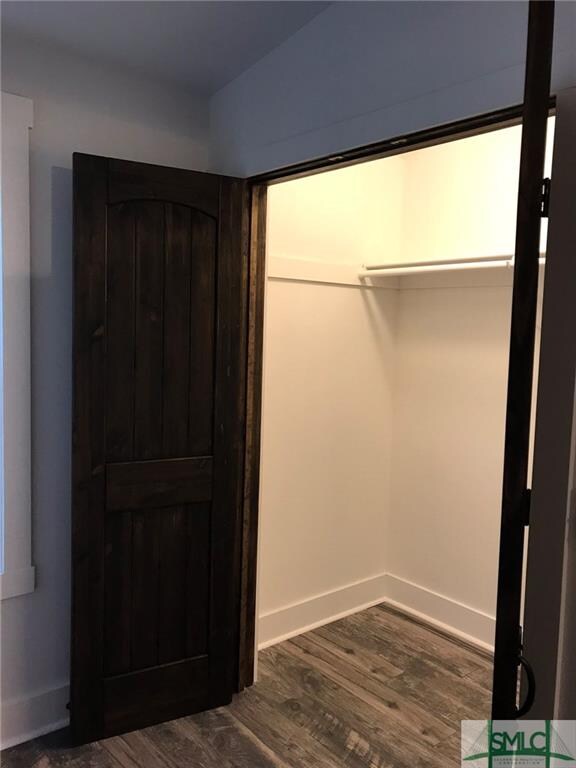 Inside large lighted closet
