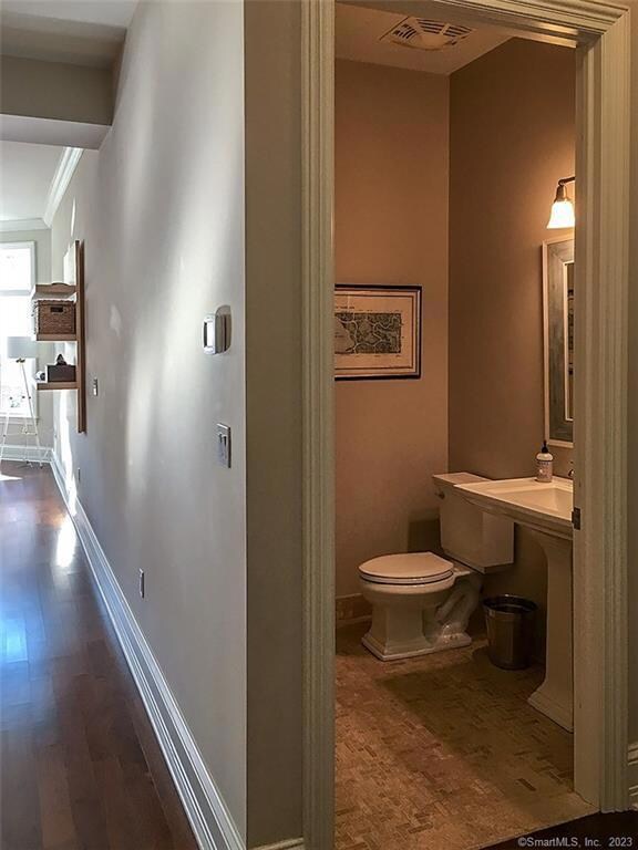 Guest bathroom with mosaic stone floor
