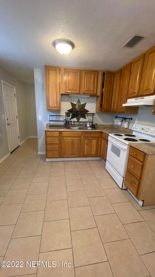 2327 Burpee Dr, Jacksonville, FL 32210 - photo 5