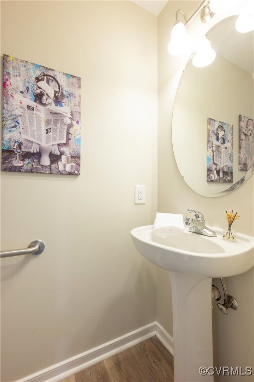 Bathroom with wood-type flooring