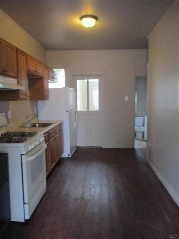galley style kitchen with gas stove