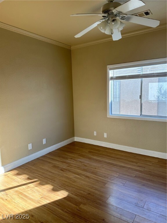 Unfurnished room featuring visible vents, ornament