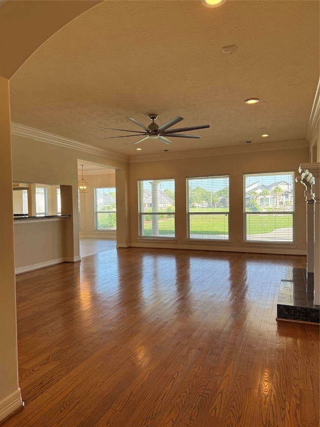 Large family room featuring open floor plan with a