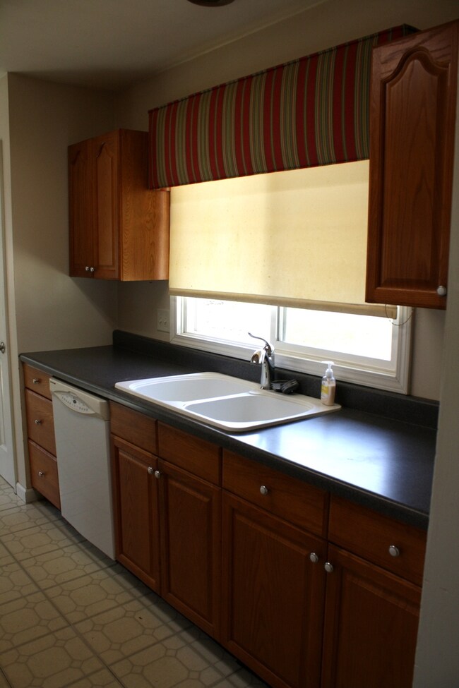 Custom valance, and well cared for counter tops an