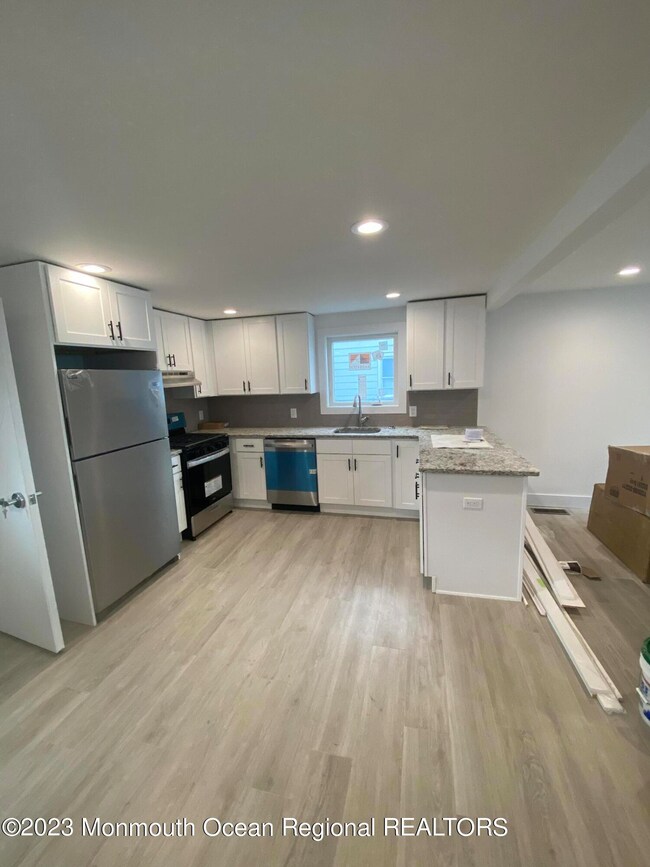 Open concept living dining kitchen