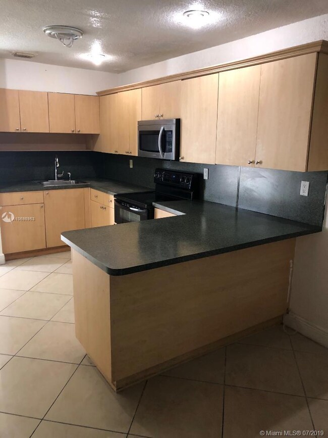 6552 W 2nd Ct unit 11, Hialeah, FL 33012 - photo 4