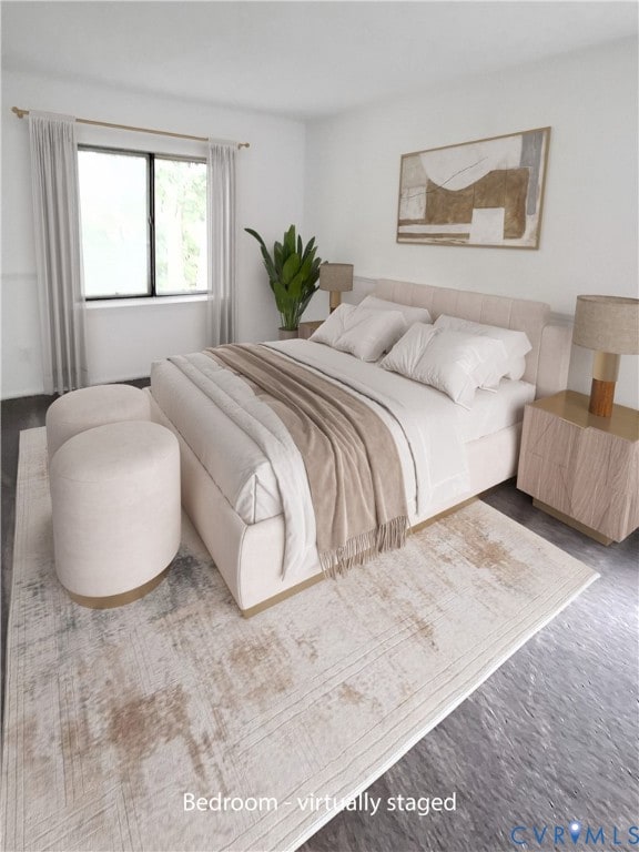 Bedroom with walk-in closet and 2 windows