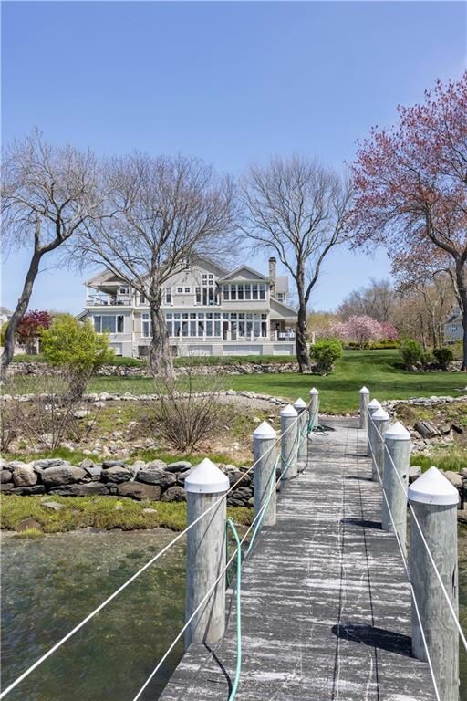 Views to the house from dock.  The lot is elevated