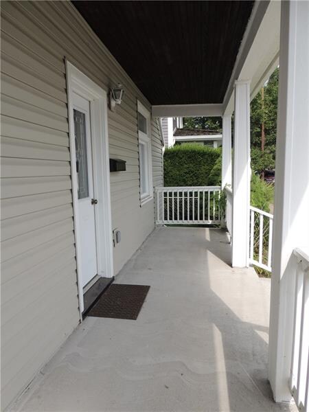The spacious front porch provides lots of room for