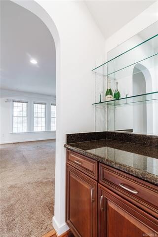 Butler's Pantry located off the dining room with g