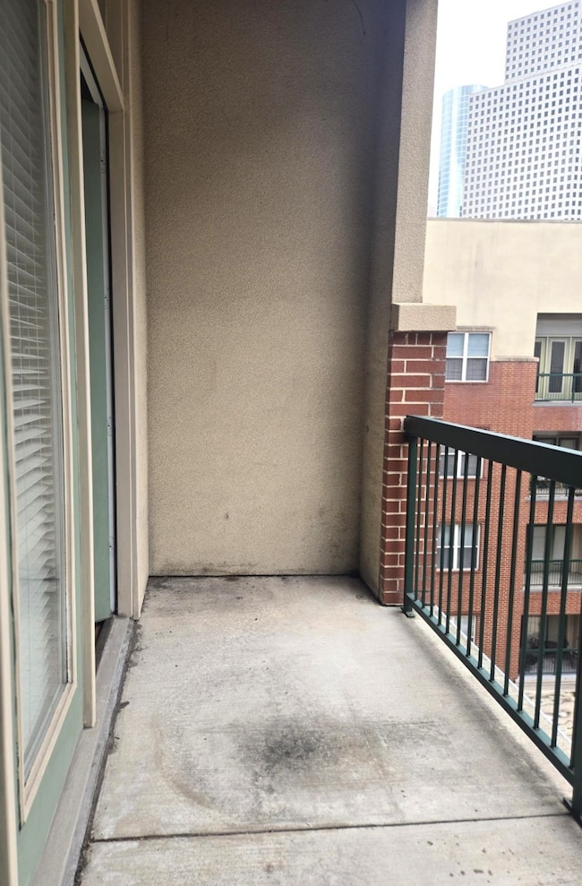 Another view of the large covered balcony.  Picture your outdoor furniture here. Great to entertain or just relax.