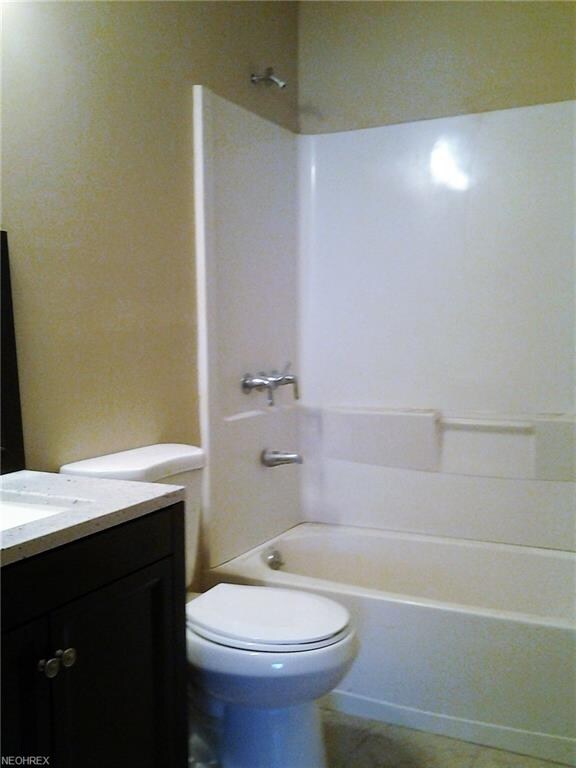 Renovated bath with new vanity with granite top, n