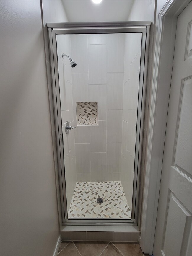 1st floor Secondary Bedroom's En-Suite Bath has a walk-in shower!