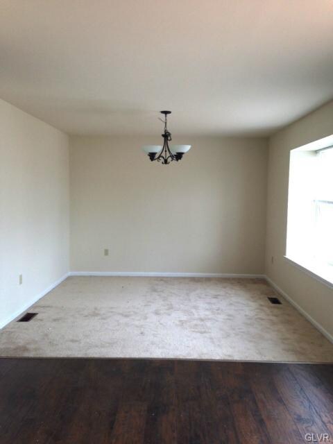 New Kitchen Floor leads into the dining room ~ Box