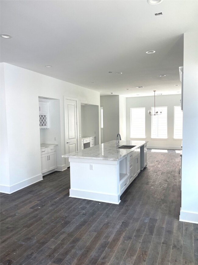 Kitchen is in the Middle of  the Living Room and D