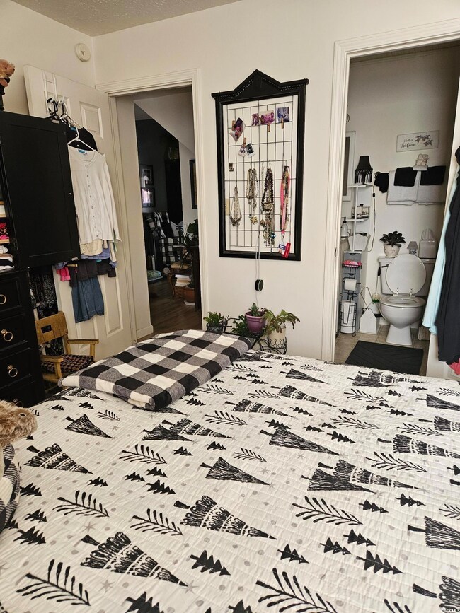 Bedroom featuring hardwood / wood-style floors, co