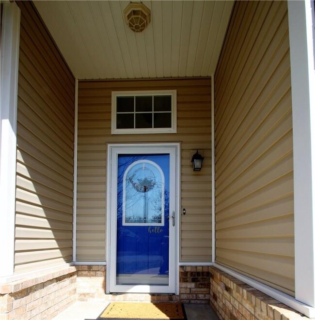 hello!  Covered entry.  Solid store door.