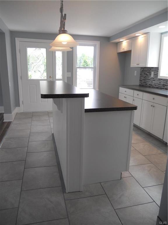 The breakfast bar and plenty of counter space