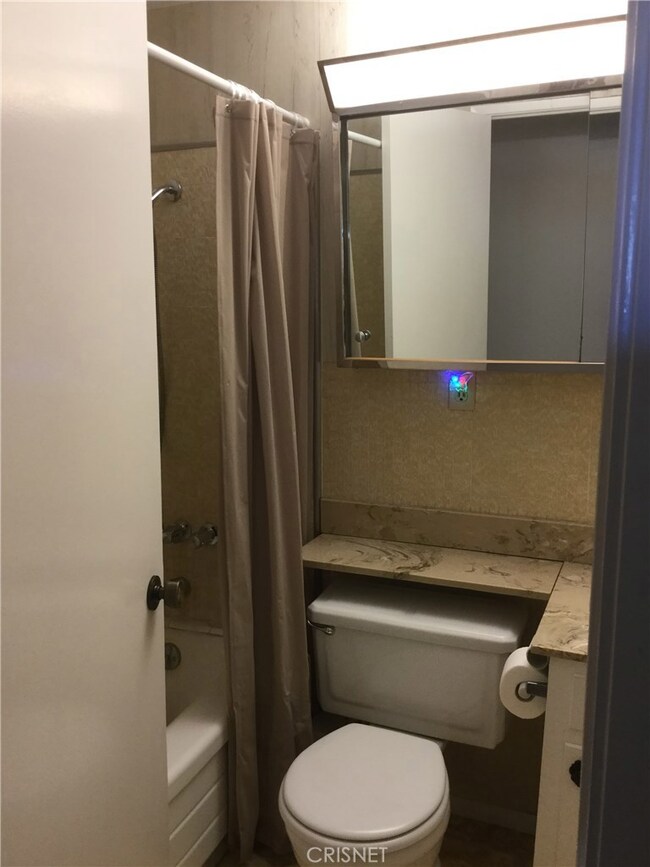 Tub/shower in hall Bath