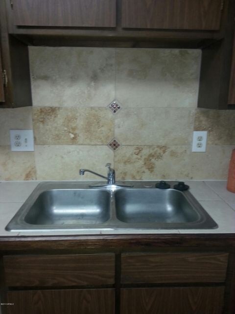 Terrazzo backsplash with glass inserts