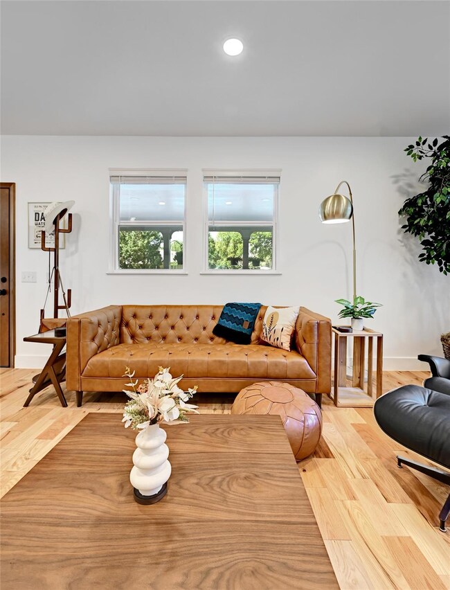Living area with wood finished floors, healthy am