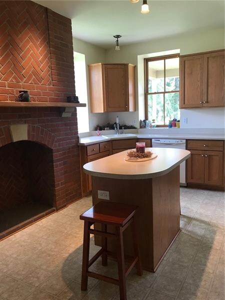 Oak cabinets.  Custom made with a brick fireplace 