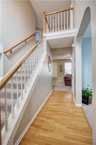 front hall with family room in back, living room o