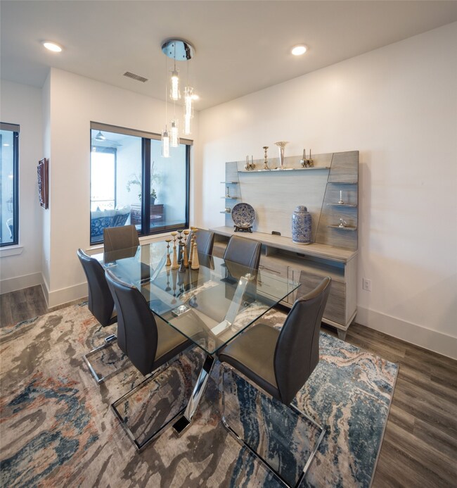 Dining room looks out to beautiful views.