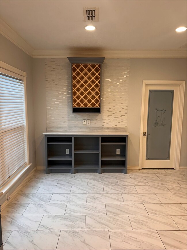 View of the breakfast area from the kitchen and th