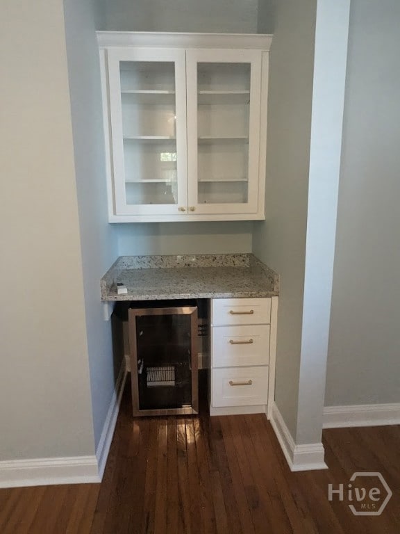 Living room alcove with beverage chiller and cabinet for glassware