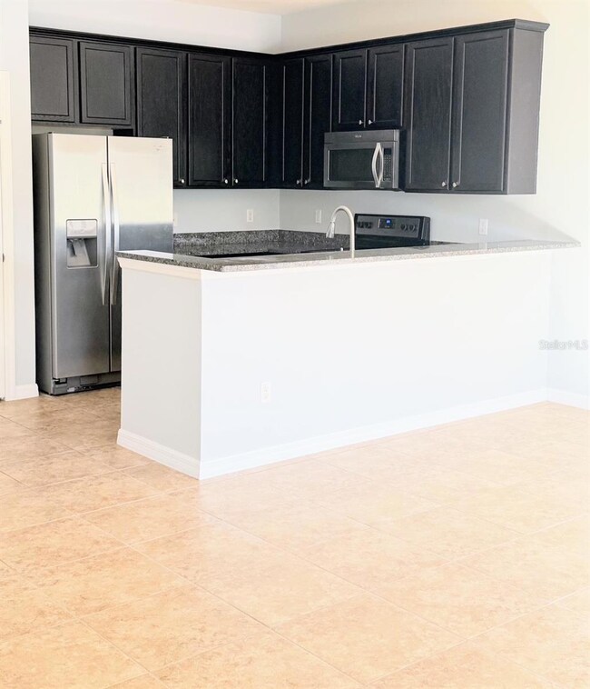 1061 Honey Blossom Dr, Orlando, FL 32824 - photo 6