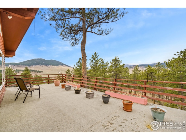 Take a break on this deck and enjoy the mountain views!