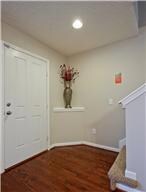 Your entry way to living room, dining room and kitchen and upstairs.  Various photos are owner and builder previous photos (used by permission)