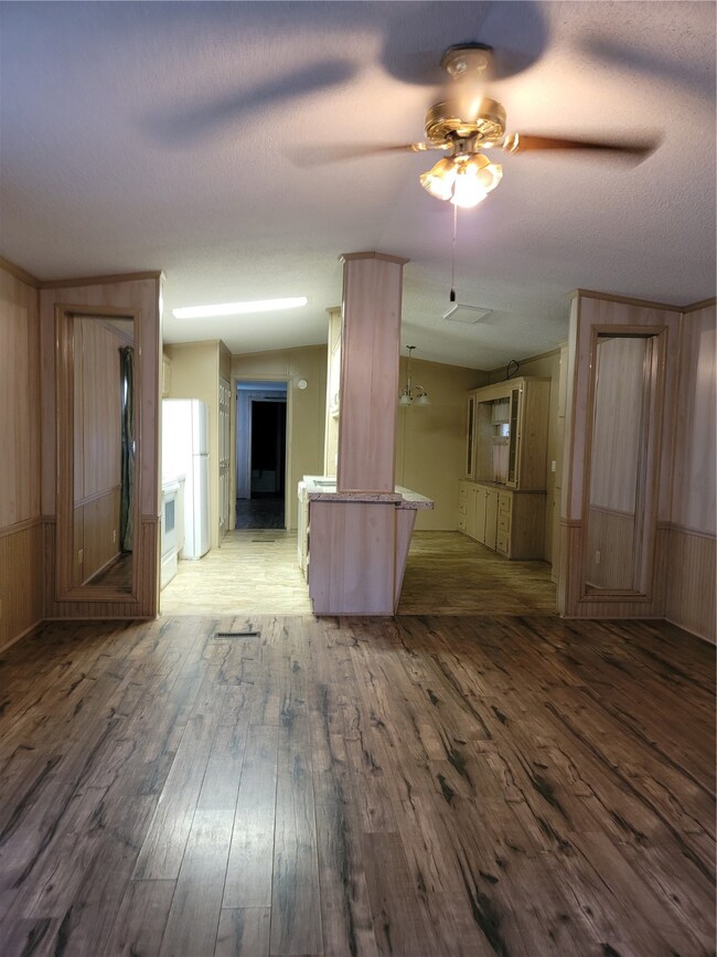 View from den to kitchen and breakfast area