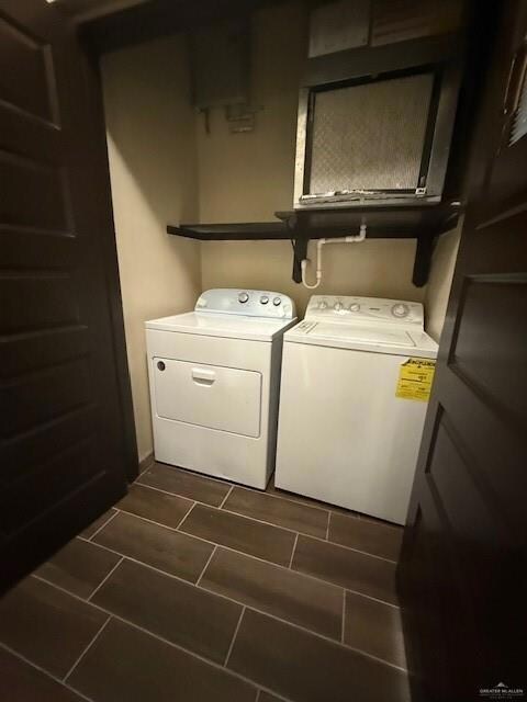 Washroom featuring washer and dryer
